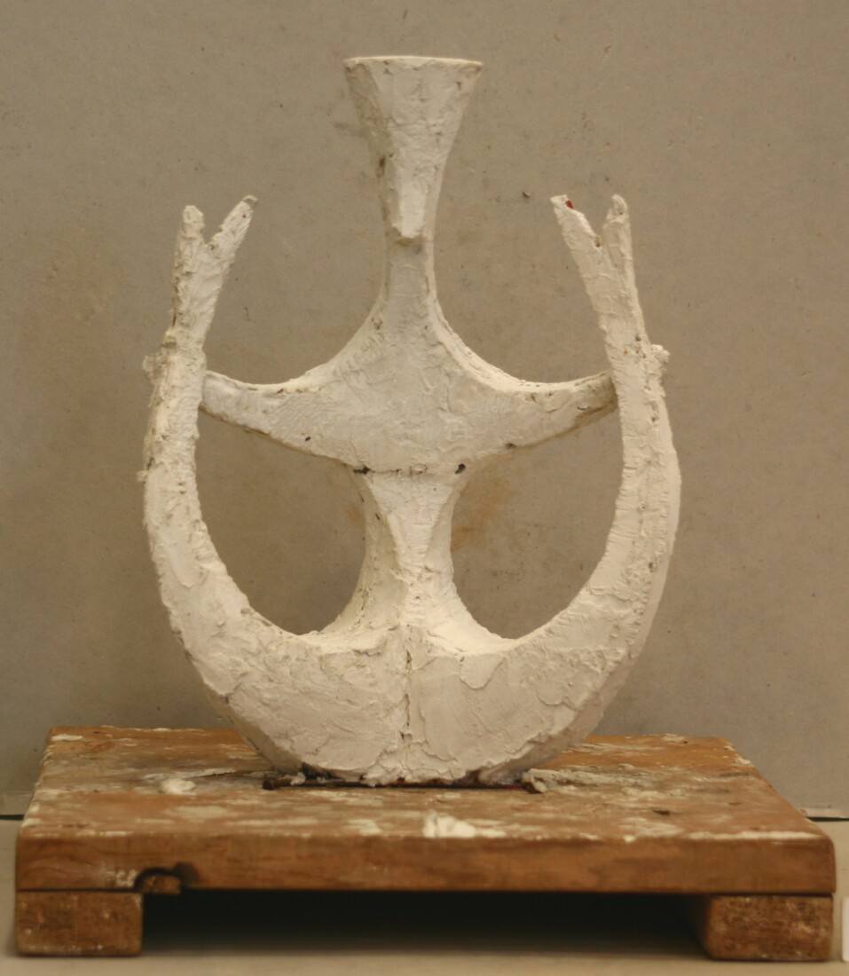Plaster model on wooden stand; from that, a bronze work was later produced.