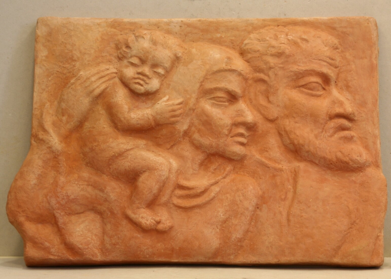 Ceramic art work pressed into a ceramic or plaster mould