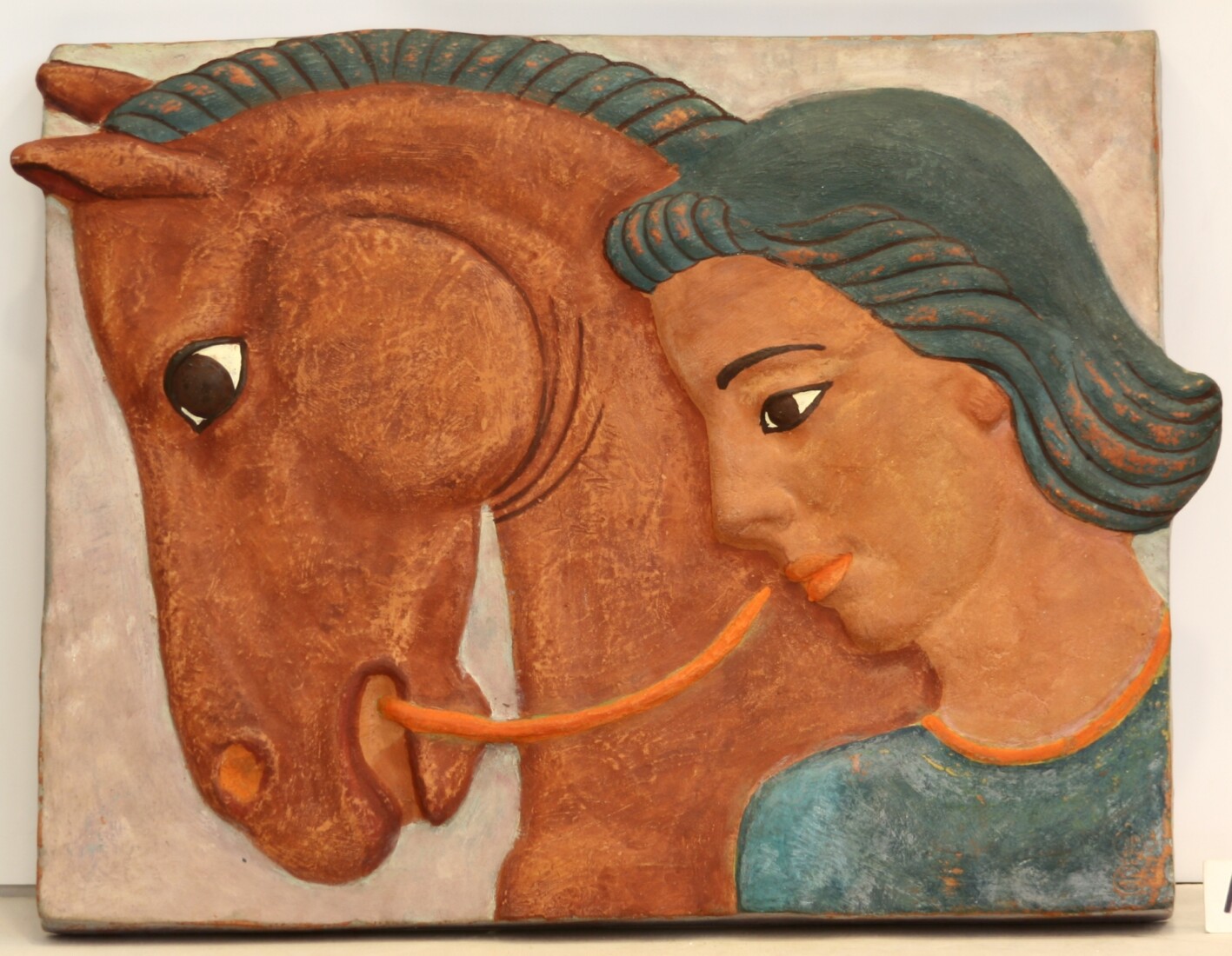 Hand-coloured ceramic relief