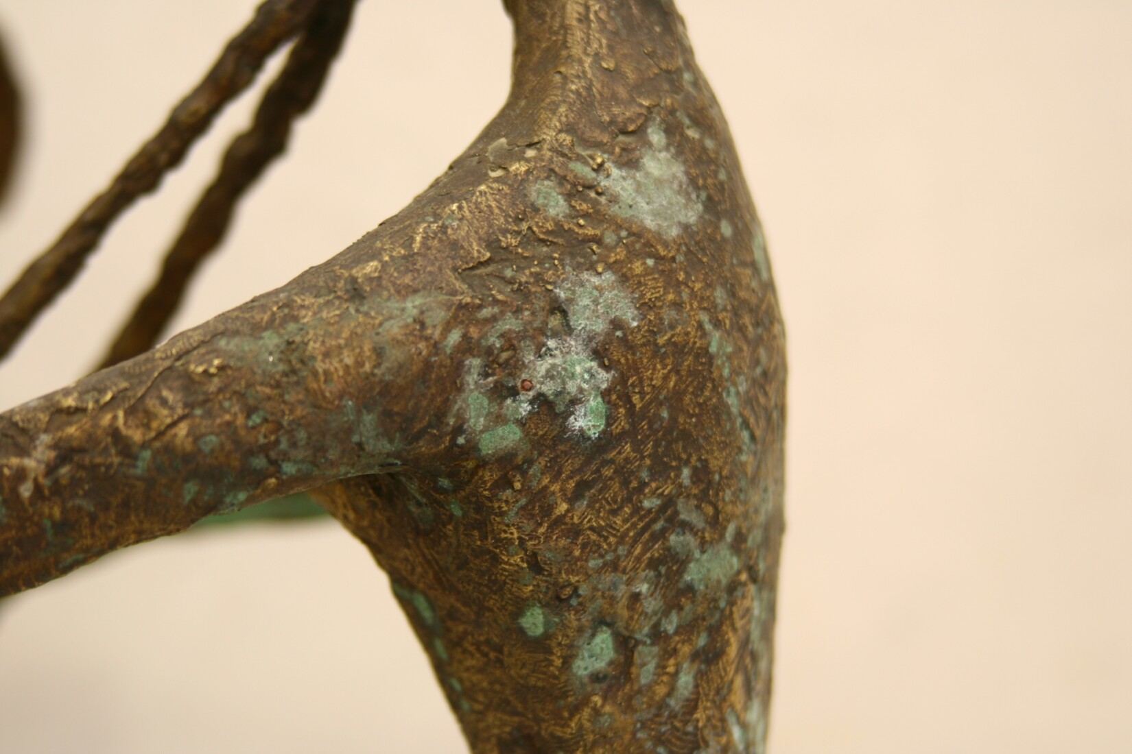Corrosion products on bronze art work surface