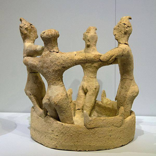Circular dance on the sacred threshing floor; clay model from Kamilari tholos tomb, Aghia Triada, Crete.